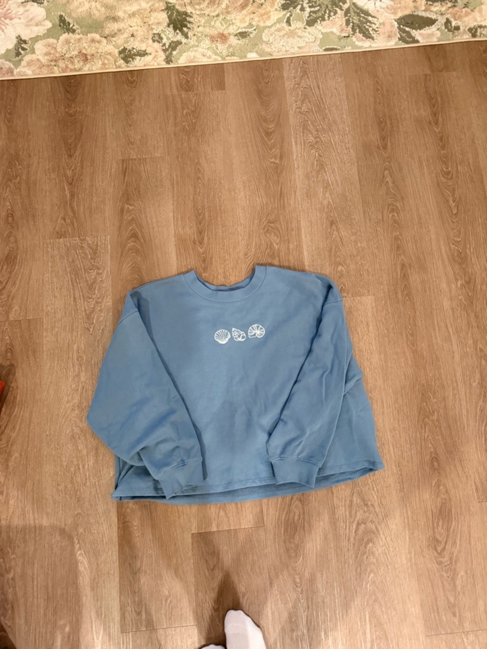 Blue Crewneck Sweatshirt with White Shell Motif